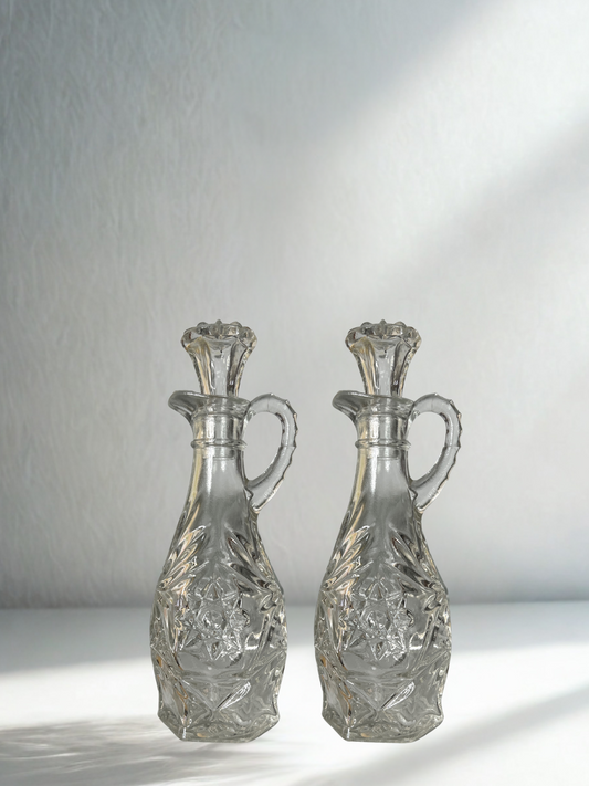 Set of 2 Vintage Pressed Glass Cruets with Stoppers – Starburst Pattern